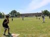 Following the assembly, students broke into teams and played a game of Wiffle ball with Mr. Figueroa as pitcher.