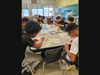 Uniondale Scholars framing model smart homes using renewable energy.