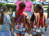 Photo 2: GSNC Daisy and Brownies holding hands at the S’mores Day event.