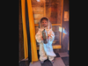 Honey Hoopla child participant wearing the beekeeper suit 