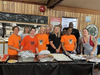 Maureen Early and volunteers preparing the lunch food for the program