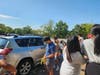  Lawrence High School seniors washing cars at their fundraiser
