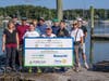 The Reworld™ volunteers with the check presentation at the Creek Rd Nursery Docks