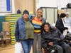 Nassau County Legislator Siela A. Bynoe with community members at the Thanksgiving turkey giveaway