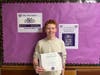 Ian Donenfeld with his Service Above Self Award, recognizing the annual toy drive he organizes with his mother.