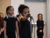 Students Brooklynn Mayo, left, and Bailey Wright performed at Washington Rose Elementary School’s celebration in honor of both Black History Month and Women’s History Month. 