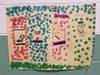 Student posters promoting sustainable practices at Sunrise Drive.