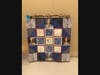Robert W. Carbonaro students created a dress out of paper and a storytelling quilt. 