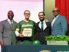 Westbury High School principal David Zimbler, second from left, is officially inducted into My Brother’s Keeper.