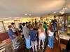 Riverhead High School students learn about jazz history and interact with significant artifacts at the Jazz Loft.