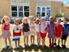 Riley Avenue Elementary School students celebrate Flag Day together.
