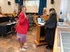 Uniondale School District Board of Education Trustee Yvette Janniere, left, takes her oath of office.