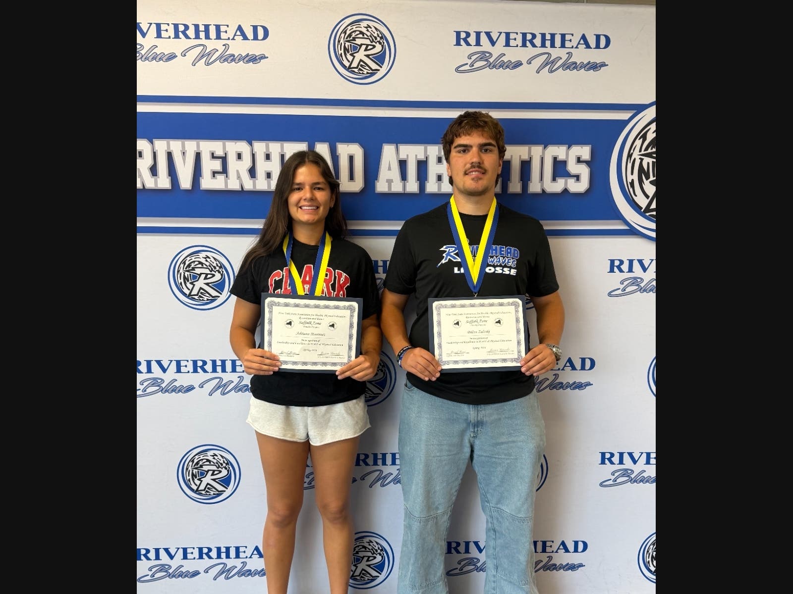 From left, Riverhead High School class of 2026 seniors Adriana Martinez and Dillon Zaleski receive the 2025–2026 NYS AHPERD Suffolk Zone Awards.