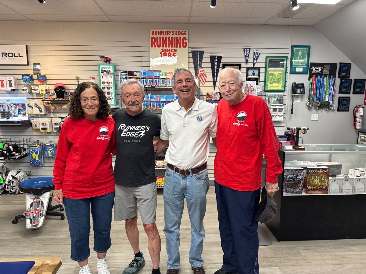 (L-R) Sherry Bellovin; Bob Cook, owner of Runner's Edge; Glen Wolther, President and Co-Founder of All Round Foods; and Myron Bellovin, Race Director of the Long Island 6 Hour 60th Birthday Celebration Run & Relay.