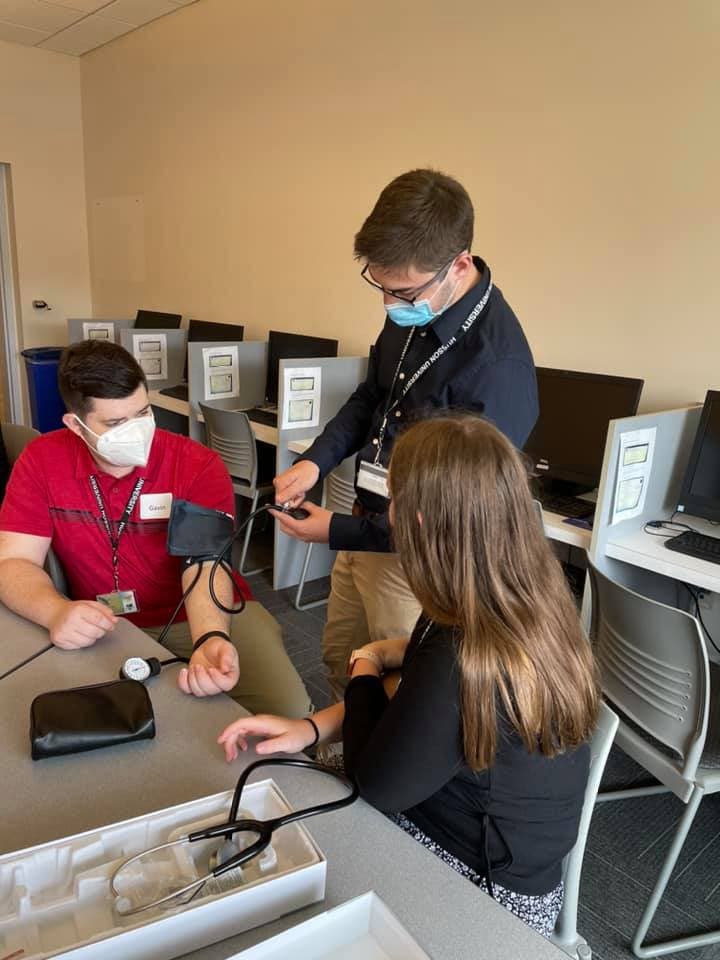 Learning to take a blood pressure reading Learning to take a blood pressure reading