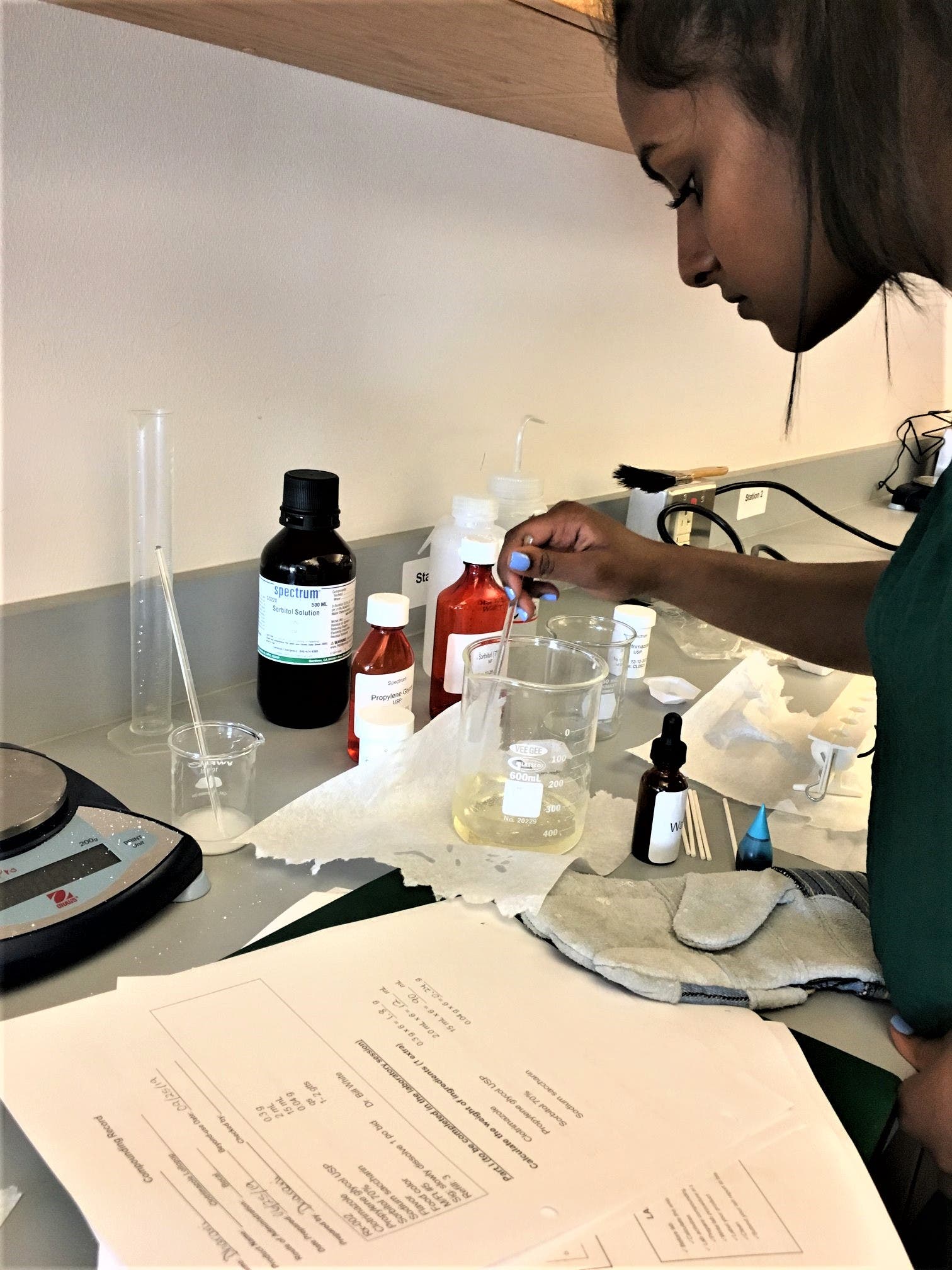 Student mixing in a laboratory at Husson University's Pharmacy Summer Camp. Student mixing in a laboratory at Husson University's Pharmacy Summer Camp.