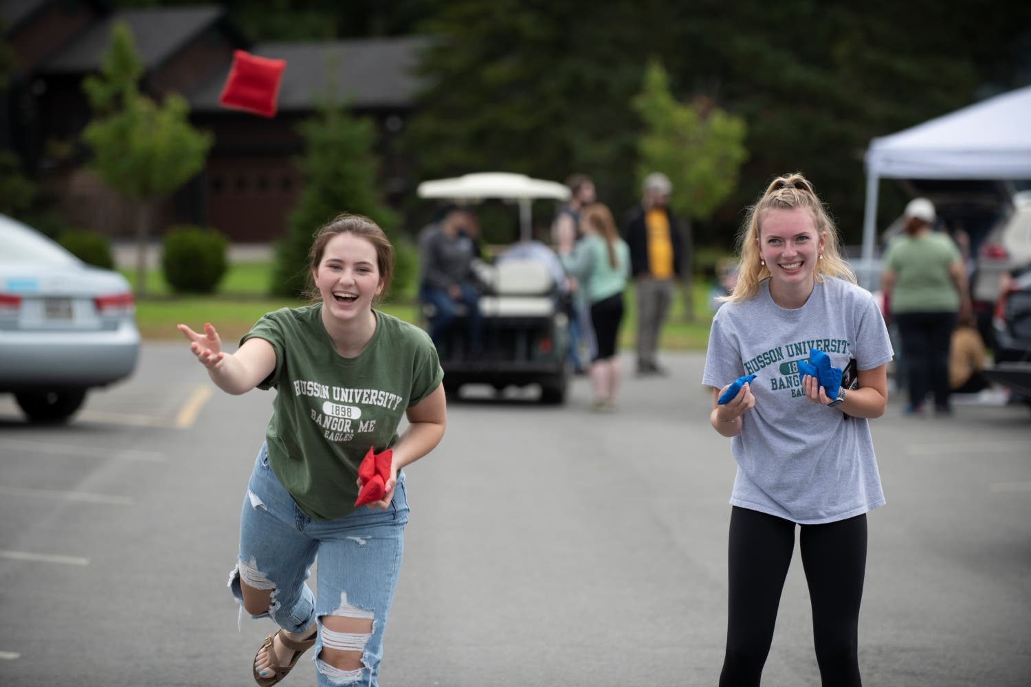 Husson Students Playing Cornhole