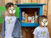 Isaac and Anthem Au, aged 5 and 2 ½ years old, participate in Little Free Pantry program.