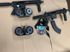 Found four assault rifles, three handguns, several large-capacity magazines, a bulletproof vest, narcotics and ammunition were found during the arrests, sheriff's officials said.