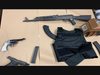 Found four assault rifles, three handguns, several large-capacity magazines, a bulletproof vest, narcotics and ammunition were found during the arrests, sheriff's officials said.