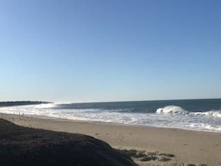 Half Moon Bay State Beach on a crystal clear autumn day.