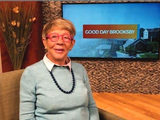 As amenities at Brooksby Village began to strategically reopen, Carol Bortman was delighted to return to the community’s in-house television studio, where she volunteers as a program host. 