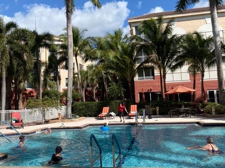 Community members enjoy a water aerobics class at Devonshire