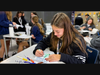 MSDA student Lena Tusche '26 decorates a card for the Operation Smile project.