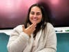 Dr. Amanda Oliva demonstrates sign language.