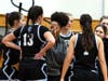 Mount St. Dominic acting head coach Kyla Ramseur talks to the team during a timeout this season against Holy Angels. Ramseur took over the head coaching duties mid to help guide the Lions. Mount St. Dominic finished with a 15-12 overall record. 