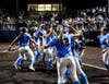 Mount St. Dominic softball team celebrates another Essex County Tournament championship on May 16 at Ivy Hill Park at Seton Hall University. The Lions defeated Columbia, 1-0, in the final, to make it back-to-back county titles. 