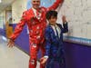 5th grade teacher Brian Quinn & 5th grader Saeed Pendleton wore holiday suits for the 15th annual Woodmont Elementary School GIVING DAY assembly. 