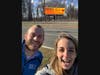 Valley View Elementary School 3rd grade teachers John Larkin and Amy Falk take a selfie in front of the Route 46 billboard in Pine Brook, NJ, that posts their names and a message of thanks.