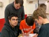 Abhijit (looking directly into the camera is hard at work at the tournament last Sat. 