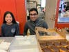 Joelle Moy and Abhijit Gehlaut raising funds through selling food at the tournament.