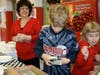 Zein supervising youth volunteers as they raise funds for charity