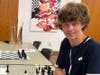 Johnny Dawson teaching chess at Shelter Island in NY