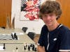 Johnny teaching chess at the Library in Shelter Island