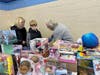 Jack Weed and a Volunteer from Barrington setting up the gifts for the children.