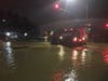 An armored police vehicle makes it way through flooded Petaluma streets early Feb. 27, 2019.