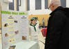 Alissa Mauldin of Elmira 4-H Club answers a question about skin and eye problems in pigs. She won a gold for her work.