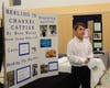 Beau Westad of the Suisun Valley 4-H Club explains his project, "Reeling in Channel Catfish." He won a gold award.