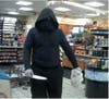 The knife-wielding, masked suspect in at least five armed robberies in Vacaville, CA is shown in a surveillance image.