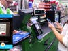 A customer uses the Walmart.com app