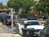 A downed power line and tree block a Martinez street Friday, May 17, 2019.