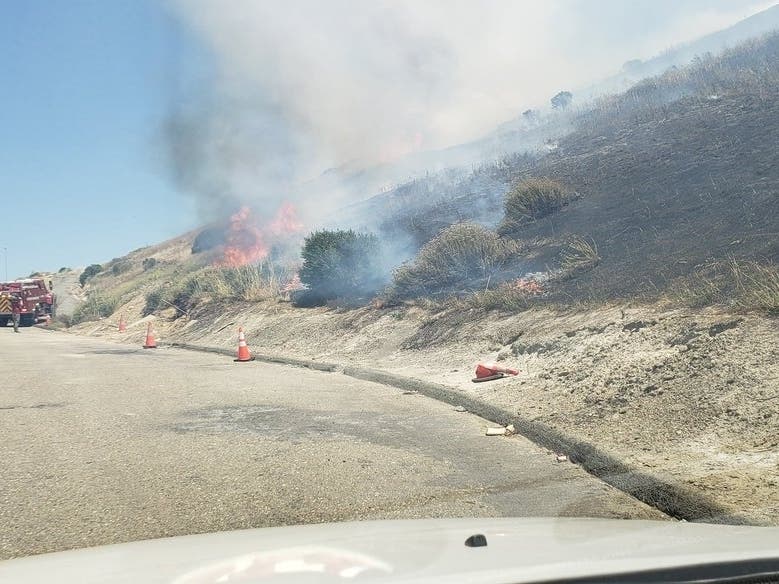 The Willow Fire burns Thursday, June 6, 2019 along state Highway 4 near Willow Pass Road in Contra Costa County, Calif.