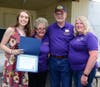 Maggie Swanson (left), founding Friend JoAn Giannoni, Friends' president Donnie Huffman and Friends' chair Carrie Hamel