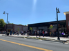 Customers wait in line for the grand opening June 21, 2019 of Cinnaholic at Todos Santos Plaza in Concord, California.