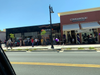 Customers wait in line for the grand opening June 21, 2019 of Cinnaholic at Todos Santos Plaza in Concord, California.