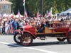 Dominick, 14, and Tilio, 11, ride with their firefighter dad, John Coni, in a 1923 Chemical Wagon, July 4, 2019, Sonoma.